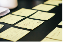 Series of sticky notes for planning out something on a table